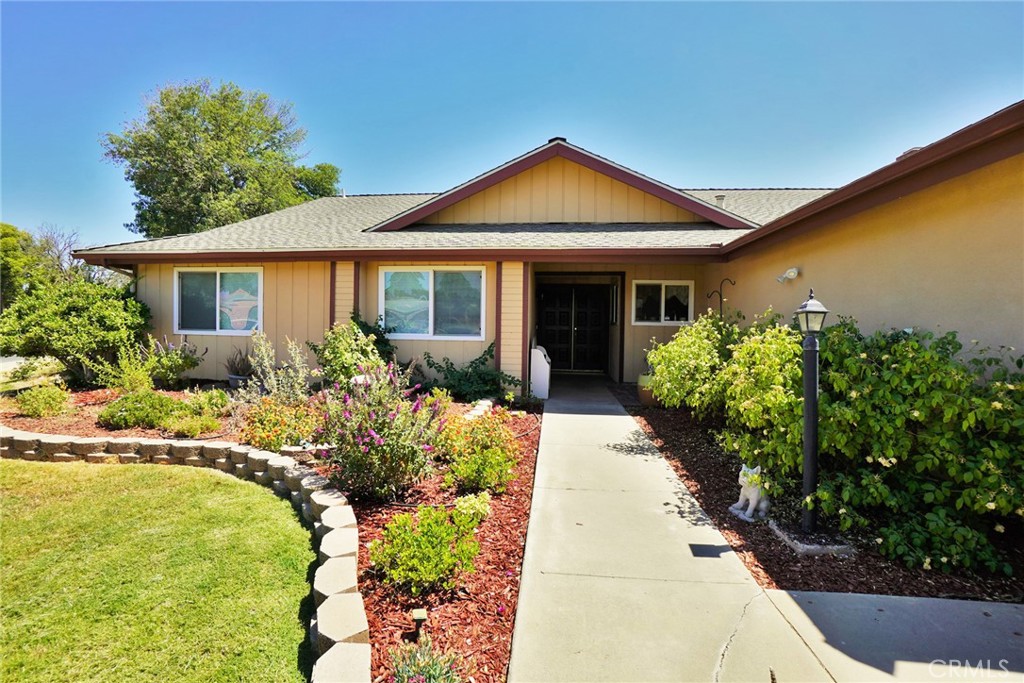This beautifully updated 2,051 sq ft home built in 1980 offers comfort and style, featuring 3 spacious bedrooms and 2 modern bathrooms. Situated on a generous 14,300 sq ft lot, this property provides ample space for outdoor living and future possibilities. Step inside to discover brand-new flooring throughout and freshly painted walls, giving the home a fresh and inviting feel. The kitchen is a true highlight, with stunning quartz countertops, a new sink, and a stylish backsplash that perfectly complements the space. The home also boasts newer windows, allowing natural light to flood the interiors and Leased Solar panels. Stay cozy in the living room with the warm glow of a fireplace, ideal for those cooler evenings. Additional updates include a new hot water heater, ensuring comfort and convenience for years to come. Don't miss out on this incredible opportunity to own a beautifully updated home with a large lot perfect for outdoor enjoyment or expansion. Schedule your showing today!