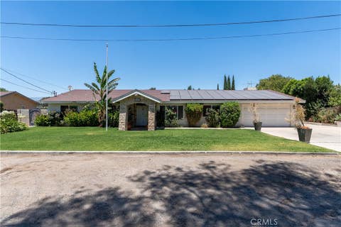 Photo of 10865 Wagon Train Ln LN, Jurupa Valley, CA 91752 (MLS # IG26143092)
