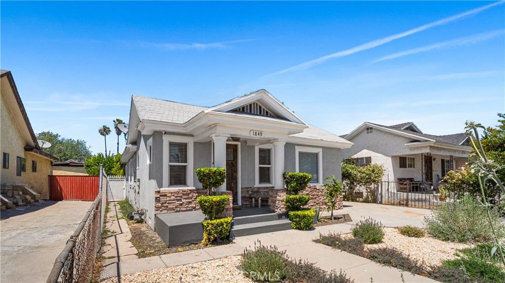 Photo of 1849 W 38th Street, Los Angeles, CA 90062 (MLS # PW26113353)