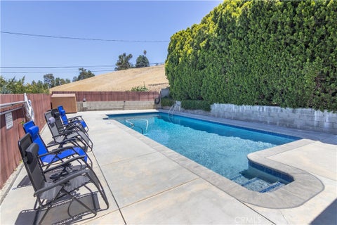 Photo of 22436 Ave San Luis, Woodland Hills, CA 91364 (MLS # SR26125438)