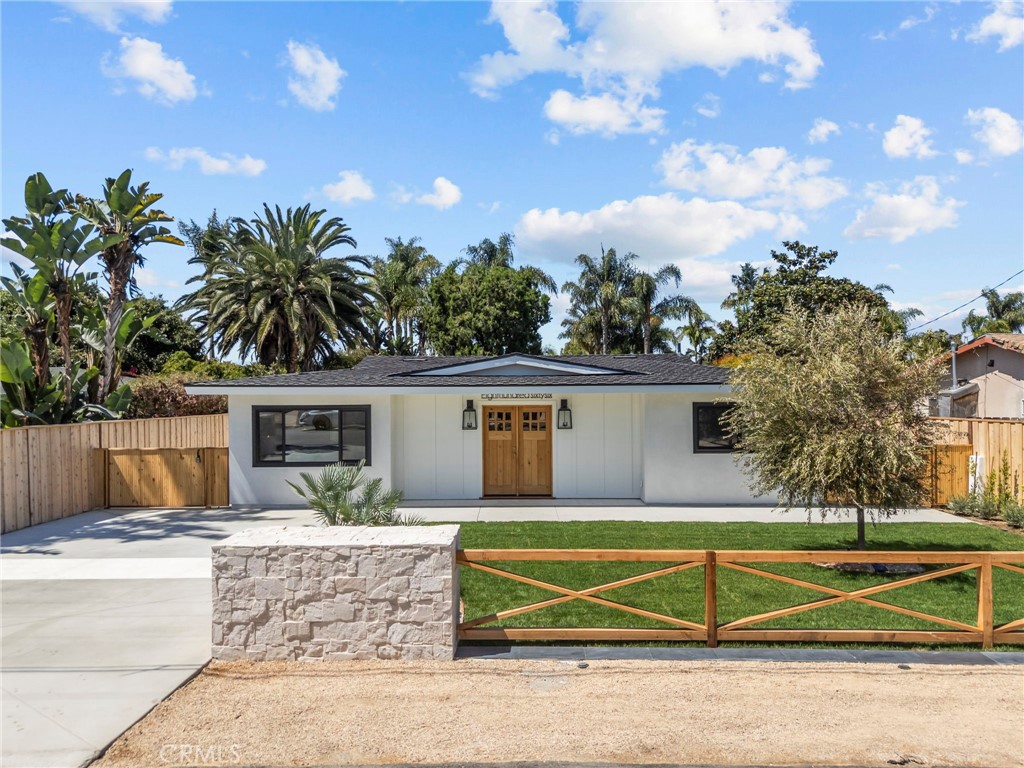 Just one mile from the ocean, this beautifully renovated single-story, 3 bedroom, 2 bathrooms, home captures the best of modern coastal living. Every detail has been upgraded, including beautiful hardwood floors throughout, new roof, plumbing, tankless water heater, HVAC, windows, and more. The Chef's kitchen is the centerpiece, boasting top of the line appliances, porcelain countertops, and custom cabinetry. From here, a full wall of bi-fold doors opens to the backyard creating and effortless indoor outdoor flow- perfect for entertaining. The thoughtful layout includes a newly added laundry room, spacious bedrooms, and spa-inspired bathrooms. Step outside to your own private retreat, where the expansive backyard features lush green grass, a peaceful setting, and plenty of room to design your dream pool or outdoor living space. Located in the highly sought after city of Encinitas, known for its hip coastal vibe, charming shops and restaurants, and top rated schools.