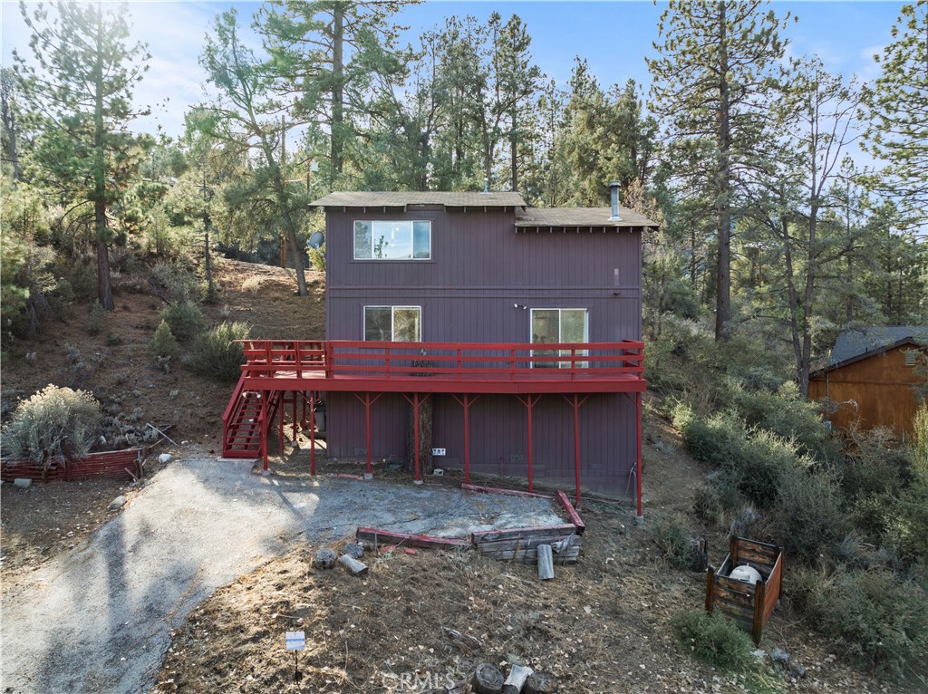 Welcome to this fantastic home in Pine Mountain Club! This beautifully updated 3-bedroom, 2-bathroom retreat features soaring high ceilings with charming, beamed accents, spacious living areas, and stylish laminate flooring throughout. The kitchen is a chef’s delight, with gleaming granite countertops, an island, and brand-new lighting fixtures. Enjoy seamless indoor-outdoor living with an open floor plan that flows effortlessly onto a large wrap-around deck, offering breathtaking views of the surrounding mountains.
Each of the bedrooms is generously sized, providing plenty of room for comfort and relaxation. Recently updated and move-in ready, this home offers a perfect blend of modern conveniences and rustic charm. One bedroom downstairs, and two upstairs plus loft area.
Nestled in the serene Pine Mountain Club community, a hidden gem in California’s highlands, you'll have access to a range of amenities just a short walk away. Enjoy an active lifestyle with tennis, golf, swimming, dining, and entertainment all at your doorstep. Whether you're seeking relaxation or adventure, this peaceful mountain retreat is the perfect place to call home.