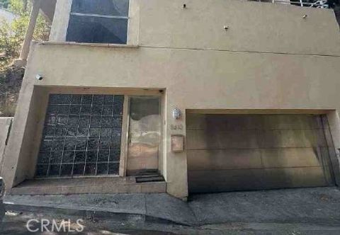 Photo of 8613 FRANKLIN Avenue, Los Angeles, CA 90069 (MLS # IV26043471)