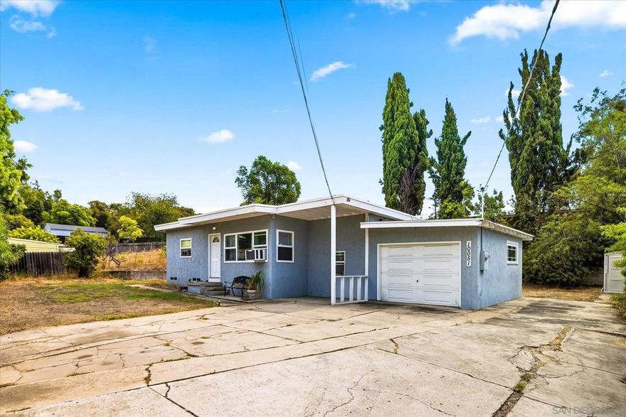 Discover this charming 2 bedroom, 1 bathroom single story home in the heart of Spring Valley. Offering 810 square feet of comfortable living space, this property features a long private driveway with plenty of room for multiple vehicles and RV parking. The large backyard provides endless opportunities for entertaining, gardening, or future expansion. Conveniently located near shopping, dining, and with easy freeway access, this home combines comfort, privacy, and convenience in one great package!