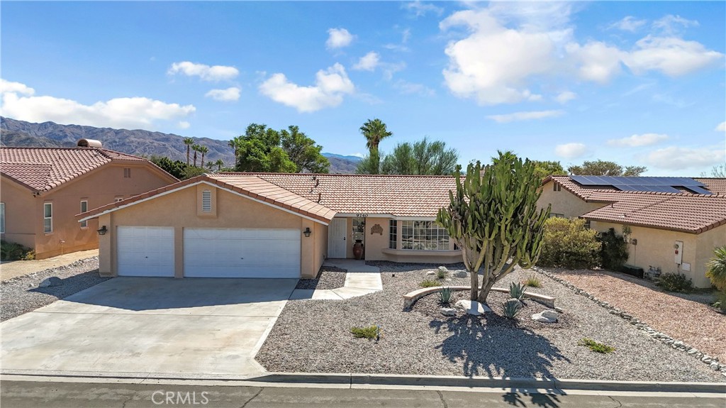Renovated Home in Mission Lakes Country Club — a Hidden Gem Golf Community where Owners Enjoy Unlimited Golf with No Green Fees for two owners. This beautifully updated 3 bed, 2 bath, 1,772 sq ft home sits on a generous 7,841 sq ft lot and is filled with modern upgrades.
Inside, the open floor plan features a bright living room with a bay window framing breathtaking mountain sunset views. The new kitchen offers quartz counters, brand-new cabinets, stainless steel appliances, and a spacious island. Both bathrooms have been fully redesigned, with the primary suite showcasing a spa-like walk-in shower. A dedicated laundry room adds everyday convenience.
Recent updates include a NEW Roof, NEW HVAC system, new slider door, new kitchen and bedroom windows, new flooring, and interior paint. Outdoors, the property features low-maintenance rock landscaping, a new irrigation system with 30 new Ficus trees for privacy, and a shady jacaranda tree for natural beauty. The 3-car garage provides ample storage and space for a golf cart.
Beyond the home, Mission Lakes offers a resort lifestyle with a full-service clubhouse restaurant & bar, pro shop, tennis courts, fitness center, resort-style pool & spa, and year-round activities and clubs.
Perfect as a year-round residence or seasonal retreat, this property is ideally located just 15 minutes from downtown Palm Springs, 30 minutes to Joshua Tree National Park, and 25 minutes to Cabazon Outlets & Morongo Casino.