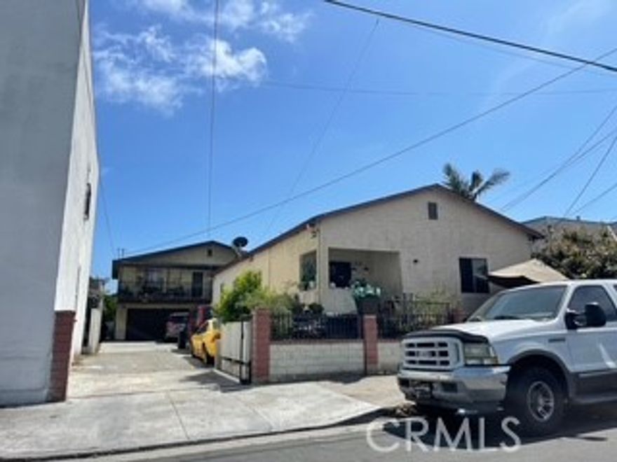 Welcome to a rare investment opportunity at 221-223 W 10th St in the vibrant San Pedro, California! This well-maintained triplex offers three distinct units with a total of 3730 sq ft of living space on a spacious 6752 sq ft lot, perfect for investors or owner-occupants seeking rental income.

221 W 10th St (Front House): This charming 4-bed, 3-bath home boasts ample space for a growing family, complete with two dedicated parking spots. Bright and inviting, it’s perfect for comfortable living or as a high-demand rental.

223 W 10th St (Unit B - Bottom Floor): A cozy 2-bed, 1-bath unit offering a comfortable and functional layout. It includes one garage parking spot plus extra space, ensuring convenience for all your needs.

223 W 10th St (Unit A - Top Floor): This spacious 3-bed, 2-bath unit features an airy layout with plenty of natural light. It comes with one garage parking spot and additional space, totaling two parking spots for the unit.

Each unit is thoughtfully designed to support a modern lifestyle, offering comfort and functionality for today’s residents. The large lot provides potential for outdoor enhancements or future development. Just a half block away, the new Port of Call brings a lively waterfront vibe to the neighborhood, while stunning sunset views are a mere 5-minute walk away—perfect for evening strolls.

Nestled in the desirable San Pedro community, this triplex is close to top-rated schools, parks, and major freeways, ensuring easy access to all that Los Angeles has to offer. Don’t miss this incredible opportunity to own a versatile property in a prime coastal location—schedule your private tour today!