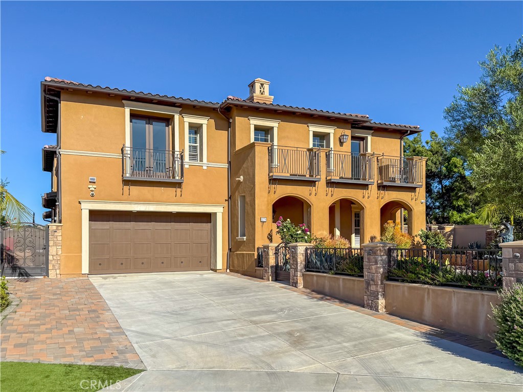 Welcome to this Mediterranean-style luxury home boasting breathtaking city light views and majestic snow-capped mountains. Its beautifully designed courtyard and stunning scenery are sure to leave a lasting impression. The home is impeccably maintained and feels like new. Upon entry, you’re greeted by soaring ceilings, and every bedroom in the house is an en-suite (all bedrooms have their own bathrooms). The primary suite is conveniently located on the first floor, with French doors opening directly to the backyard. The spacious family room, dining area, and kitchen create an open and airy atmosphere. The upgraded granite countertops and appliances add a touch of elegance to the kitchen. Upstairs, the loft opens to a front-facing balcony, perfect for enjoying the view. There is a rare opportunity to own a home with such exceptional qualities-Don't miss it!