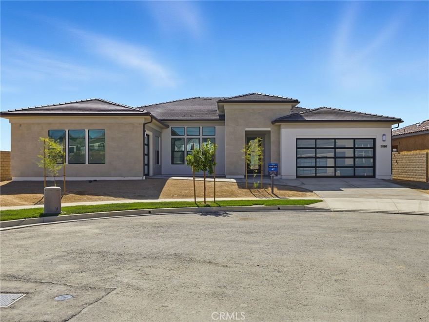 This beautifully upgraded single-story home, tucked away at the end of a quiet cul-de-sac, offers the perfect blend of luxury, privacy, and style. From the moment you step inside, you're greeted by elegant upgraded laminate flooring that flows seamlessly throughout the open-concept living spaces.
The heart of the home is a true showstopper—a designer kitchen featuring shaker style cabinets, upgraded quartz countertops, and top-of-the-line Wolf and Sub-Zero appliances. Whether you're hosting a dinner party or enjoying a quiet morning coffee, this kitchen is as functional as it is beautiful.
Enjoy indoor-outdoor living with a private backyard that opens up to breathtaking southern-facing look out—perfect for entertaining, or peaceful relaxation.  With its premier location, high-end finishes, and single-level convenience, this home is a rare opportunity you don't want to miss.