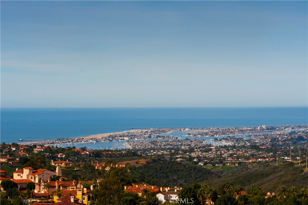 Stunning 25 Splendore has it all - single-level, totally remodeled, 2 bedroom (plus office) with 180 degree panoramic ocean, coastline, Catalina and city lights views. It has up-to-date marble kitchen and bathroom counters, and marble walk-in showers. Plus dark hardwood floors throughout. Altezza residents enjoy a resort lifestyle with full association amenities: spa, tennis courts, Jr Olympic salt-water pool and clubhouse. It's close to Crystal Cove beach, Pelican Hills 5 Star International Golf Resort and Spa, Fashion Island and Crystal Cove Shopping Center with world-class shopping and dining. Available Aug 15, 2025.