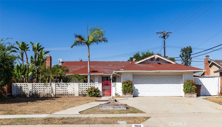 SINGLE LEVEL RANCH STYLE HOME * Welcome to this picture-perfect, fully remodeled single-family home nestled in a desirable Fullerton neighborhood. Step inside and be greeted by a bright and welcoming living room just off the entry—an ideal space to relax or entertain. The open flow continues into the kitchen and dining area. A set of sliding glass doors lead you to the expansive backyard, creating an effortless indoor-outdoor connection. The backyard features a covered patio offering shade and comfort, and plenty of room for outdoor dining, entertaining, or simply enjoying Southern California’s sunshine.  With four spacious bedrooms and two beautifully remodeled bathrooms, this home provides room for everyone. The front yard features a charming courtyard that adds privacy and a welcoming spot to relax or greet guests. A two-car garage provides ample parking and storage space, completing this move-in-ready gem. Situated on a nice, quiet street in a well-established Fullerton neighborhood, this home offers convenient access to the 57 freeway, Cal State Fullerton, and an array of nearby restaurants and entertainment. Don’t miss the opportunity to make this home your own.