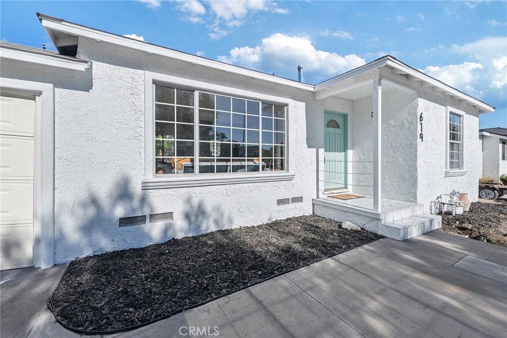 Come see this completely remodeled home done by one of the best contractors in OC area! This home was meticulously redone from top to bottom. No expense was spared on the transformation of this beautiful home. Many of the designer touches installed are highlighted by the natural light throughout the home. The vinyl flooring throughout the home is not only beautiful, but easy to maintain. The open kitchen has been completely redone with all new shaker cabinets, beautiful quartz counter tops, stunning tile backsplash and stainless steel appliances. Home is freshly painted from inside out, with endless upgrades throughout the entire home. The backyard features ample of space to create your dream backyard or even build an ADU! This home is perfect for a growing family looking to live in the heart of Orange County!