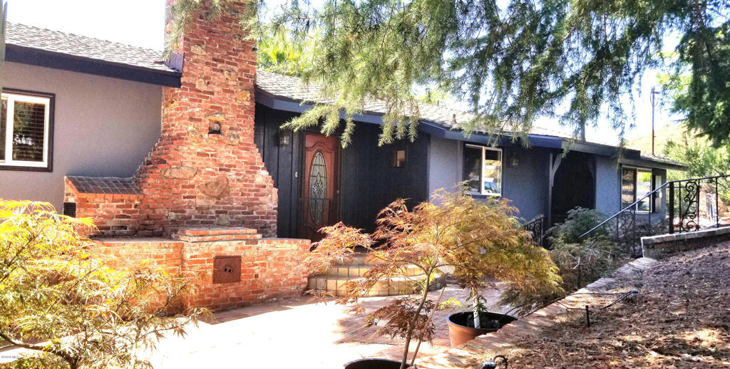 It is hard to believe you can reside in the Lake Sherwood area at such a value and affordable price, but it is true! This bright and highly updated (many upgrades recently) gingerbread cottage style single family home for lease features all of the following: A spacious great room design with a stone accented fireplace. A separate dining area with views and direct rear yard/deck access. An updated chef inspired kitchen with granite countertops, custom cabinetry, high-end (Wolf & Bosch) S/S appliances including a refrigerator & newer range hood (not pictured), breakfast/lunch bar and even a TV to watch your favorite foodie shows. Two generously sized and bright bedrooms (one with wood beamed & accented ceiling) with step-in closets and separate updated 1.5 bathrooms with high end fixtures/appointments. A private home office offers lovely views and custom built-in cabinetry & L shaped computer ready desk. An additional relaxing and bright yoga, sun, reading room, etc. offers many windows with tranquil views. The separate laundry room comes complete with a brand new high end and capacity, front loading Washer/Dryer. The artfully designed hardscaped big backyard has a huge deck and gazebo which is perfect for entertaining or just relaxing within its beautiful setting. A custom laid beautiful bricked driveway leads to a separate 2 car garage. The property is also beautifully appointed with distressed wood floors, crown molding, recently repainted interior/exterior with earth-tone colors, custom window coverings throughout, high efficiency & dimmable recessed LED lighting throughout, new oversized & efficient HVAC system with a high tech thermostat, newer roof, big shady trees & gingerbread stonework, terracotta tile & accent brick hardscaping. The property has views of the surrounding mountains & the Lake Sherwood area and offers a private lake dock with optional lake usage. Although the property is located near surrounding open space & nature, it is also conveniently minutes away from shopping/commerce/medical, restaurants/entertainment, schools, the 101 frwy and a short drive to beaches. You have to see this truly one-of-a-kind charmer, which is value priced for the Lake Sherwood area and lifestyle, all with upgrades that are normally beyond what you'd expect in a leased home! Note: Landlord is seeking Tenant w/ no pets, smoking, drugs.