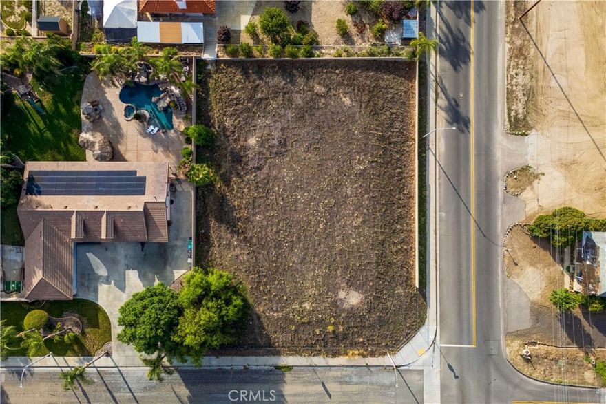 Fantastic opportunity to own a spacious vacant corner lot offering a little over 22,000 square feet in a desirable area zoned RA-2. This versatile zoning provides endless possibilities — whether you’re looking to build your dream home, establish a small ranch, or invest for future development. The lot is fully fenced and offers excellent accessibility from two streets, providing convenience and privacy. Water and electricity are available nearby, making future construction easier and more cost-effective. The generous lot size gives ample room for additional structures, gardens, or recreational space. Enjoy the peace and quiet of country-style living while still being within a short drive to local amenities, schools and parks. Don’t miss this chance to secure a prime piece of land with great potential and flexibility. Bring your imagination and explore the possibilities this wonderful property has to offer! Drive by and see it for yourself.