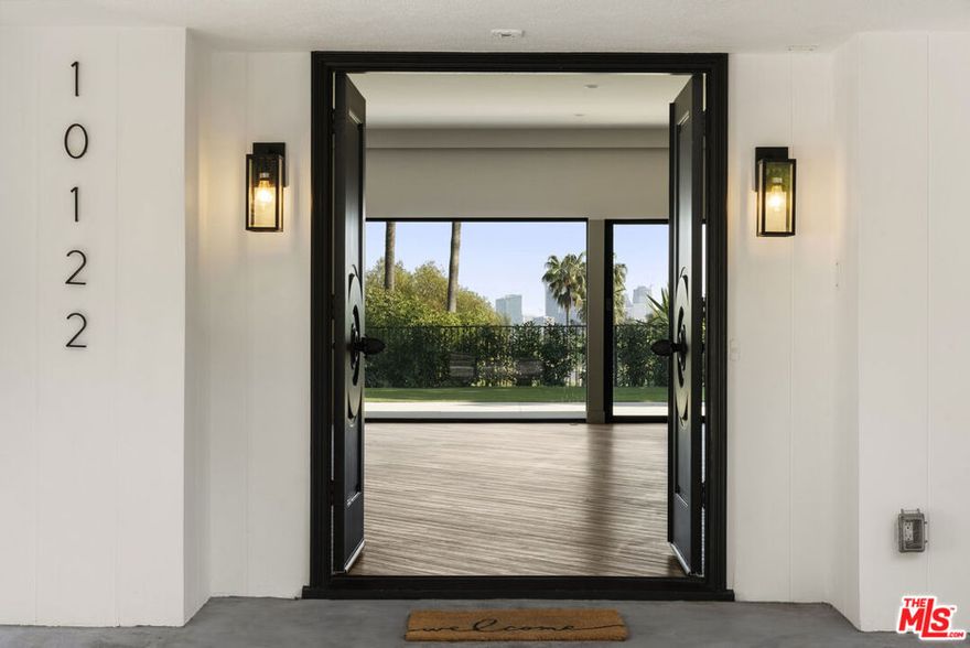 Tucked away in a quiet cul-de-sac, this newly remodeled 4 bedroom, 3 bathroom home offers the perfect blend of privacy, style, and convenience. Designed for effortless indoor/outdoor living, the open-concept layout flows seamlessly to a spacious patio and low-maintenance yard--ideal for relaxing or entertaining against the backdrop of Downtown Los Angeles and Century City. Just minutes from the iconic Beverly Hills Hotel and close to world-class dining, shopping, and nightlife. Includes 2-car garage with ample storage and oversized motorcourt that fits up to 5 additional vehicles.