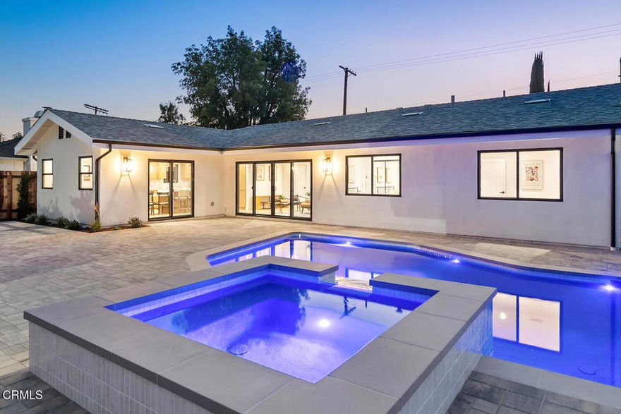 GORGEOUS, REMODELED fully permitted Luxury Pool Home in West Hills with a perfect California backyard outdoor living space!   Every detail of this 4 Bedroom and 3 bath home has been thoughtfully upgraded with top-tier brands and luxury features.   This beautiful single story home  contains new drywall, new insulation to provide energy efficiency, new roofing material, a new electrical system with a 200 amp main panel, new plumbing system including new sewer lines, new HVAC system, and a detached garage for as POTENTIAL ADU.  The detached garage is equipped with a separate sub panel along with water and sewer line access nearby for a possible future ADU and an EV charger outlet.  Some of the interior features include a chef's kitchen with all-new Thermador built in appliances, wine and beverage cooler, and beautiful quartz countertops.  The gourmet style kitchen contains a spacious kitchen island with a breakfast nook, all new cabinetry, and sleek backsplashes.  Three Luxurious bathrooms encompass this beautiful home throughout.  The upgraded bathrooms features Trinsic Champagne Bronze Fixtures, LED mirrors, and new tile and new vanities.  This premier home boast an Entertainer's backyard with a new remodeled permitted  pool and spa with a Pentair smart automation system.  Furthermore, the resort style backyard features a paver patio, a built in outdoor BBQ/Kitchen with a gas lava fire pit.  California native drought tolerant landscaping with a drip irrigation system competes this dream backyard.  This luxury home contains such top material brands as Milgard, Windoor, Thermador, Delta Trinsic, Navien, Pentair, and Angelus.  The home is located on the quieter side of Woodlake Ave.  Lastly, this Renovated Luxury home is within close proximity to schools, parks, shopping, and freeway access.