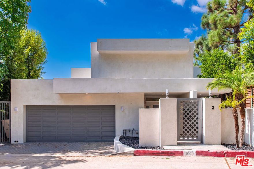 Experience luxury and serenity at this spacious and newly renovated 3-bedroom 3-bath Beverly Hills Post Office home in the highly coveted Crest streets. Perched above Coldwater Canyon, the home enjoys an open floor plan with explosive views of the canyons, mountains to Century City, Santa Monica, to the Pacific ocean and Catalina Island. The home spans 3 levels, with the primary suite on the upper level, with cozy fireplace and a huge roof top terrace commanding spectacular views. The main living areas on the ground level and 2 more bedrooms on the lower level with a long balcony spanning both rooms. There is a new stackable laundry closet. An attached two car garage and a secure gated front patio entrance. A great location only just over 1 mile to downtown Beverly Hills and Rodeo Drive and likewise close to proximity to parks, trails, and Sunset Blvd. all in one of the most desirable areas of Beverly Hills.