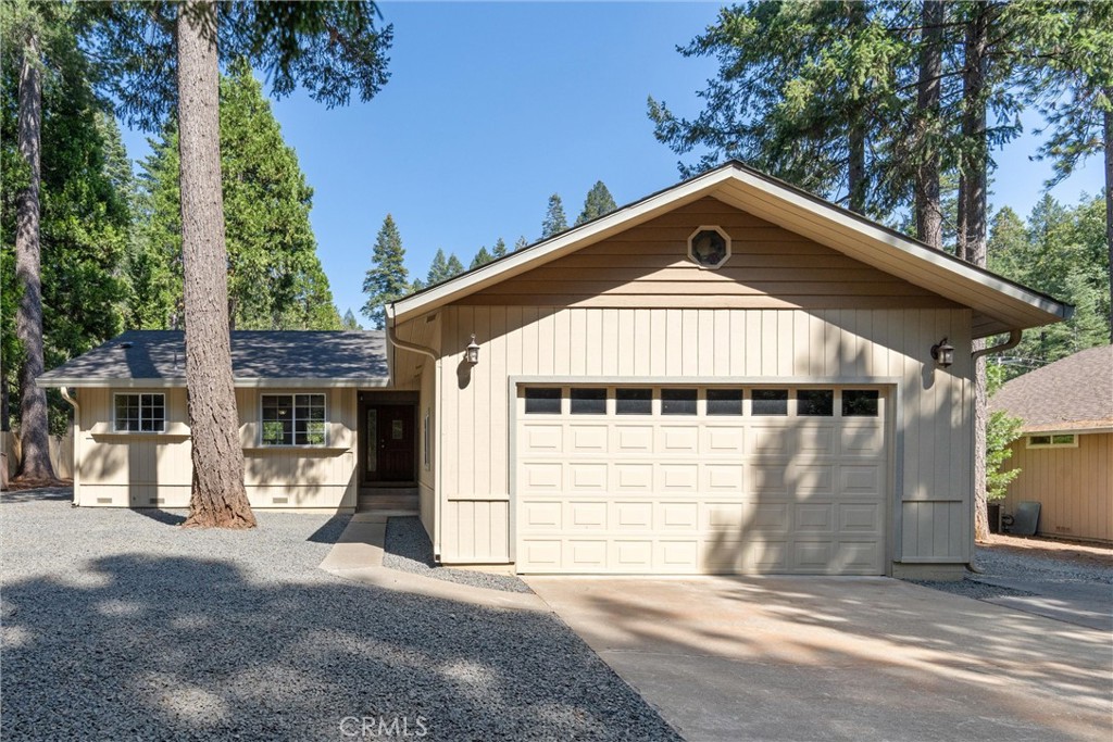 Home in the Pines – Remodeled Retreat with Dual Garages & RV Parking!! ---
Welcome to 15062 Pinon Rd, a beautifully updated home nestled in the pines of upper Magalia. Set on a spacious lot just minutes from Paradise Lake and Cedarwood Elementary, this move-in-ready property offers comfort, charm, and incredible utility — featuring an attached 2-car garage plus a 24' x 20' detached garage/workshop, perfect for hobbyists, storage, or home business needs.
Step inside to find a warm and inviting layout with thoughtful upgrades throughout. The living room boasts a freestanding gas fireplace, creating a cozy atmosphere ideal for cool mountain evenings. The kitchen has been tastefully remodeled with updated cabinetry and flooring, opening into a bright dining space and spacious living area.
This Beautiful Property Highlights: 2 bedrooms, 2 full bathrooms — both comfortably sized, Primary Suite with double closets offering plenty of separate closet space, Updated kitchen with modern cabinets, tile counters, and ample storage, Freestanding gas fireplace for cozy warmth, Large rear deck overlooking a fully fenced backyard — great for pets, kids, and entertaining, Attached 2-car garage plus 24' x 20' detached garage/workshop with power, RV parking and extended driveway for additional vehicles or toys, 1,303 sq ft of living space on a quiet, .29-acre lot, Close to Paradise Lake, hiking trails, and local amenities.
Whether you're looking for your forever home, a weekend getaway, or an investment in the peaceful mountains, this home delivers versatility, comfort, and value — all in a great Magalia location.