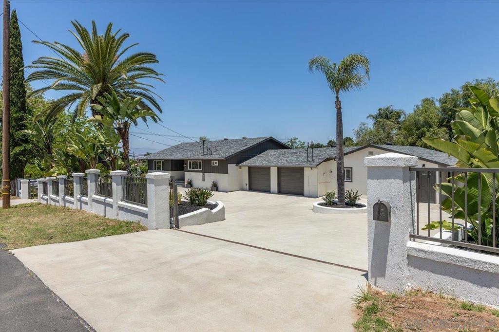 Welcome to 30118 Miller Rd in Valley Center! This fully renovated property offers two separate living units on a spacious 0.85-acre lot—ideal for multi-generational living, rental income, or a combination of both. The main home and attached 2-bedroom, 1-bathroom unit combine for a total of 6 bedrooms, 4 bathrooms, and 3,027 square feet of beautifully updated living space. Both units feature modern kitchens, stylish bathrooms, new flooring, and open-concept layouts filled with natural light. Move-in ready with contemporary finishes throughout, this property provides flexible living options in a peaceful rural setting just 1.5 miles from Valley Center High School. Enjoy the expansive outdoor space—perfect for RVs, animals, equipment, or potential future improvements. Whether you're a homeowner seeking added income or an investor looking for a strong return, this is a rare opportunity to own a turnkey property in one of North County’s most desirable rural communities.