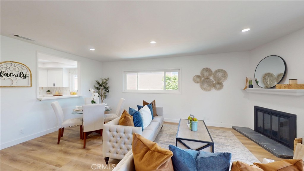 Welcome to this stunning, move-in-ready condo featuring a fresh remodel throughout! Enjoy brand-new paint, stylish flooring, sleek open kitchen countertops, and updated fixtures that create a modern and inviting space. Large living room with Cozy fireplace and balcony. Located on the second floor, this home includes a convenient stair lift — ideal for seniors or anyone seeking easy access. Two spacious Bedrooms and 2 full bathrooms. Indoor laundry, Centrail air and heating. The property also offers secure underground garage parking for two vehicles, a rare and valuable feature. Don’t miss this opportunity to own a beautifully updated condo that combines comfort, convenience, and style. this is in the center of Fullerton close to everything. do not miss on a great opportunity!!