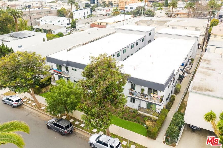 We are pleased to present a generational multifamily offering in the seaside enclave of Santa Monica. Set prominently along a tree-lined street, 1424-1428 12th Street is a trophy asset consisting of 20, oversized compared to market, units and beautifully landscaped grounds. Encompassing 17,880 SQFT and situated on a very large lot, tenants can choose from one of 2 oversized studio units, 16 large 2-bed, 1.5-bath units, or 2 substantial 3-bed, 1.5-bath townhouse units. Each of these units has a great floor plan flooded with natural light. 14 units have been luxuriously upgraded and tastefully appointed with an in-unit washer and dryer (select units), new hardwood flooring, stainless steel appliances, quartz countertops, and LED lighting. Additionally, the property has an on-site laundry facility and ample assigned parking (soft story retrofit work has been completed, Buyer to verify). The property also includes new construction windows, new roofing and gutters, a custom stucco facade, and more. A quick stroll to the beautiful beach, downtown Santa Monica, and the high-end dining and shopping of Montana Avenue and 3rd Street Promenade, 1424-1428 12th Street is close to all Santa Monica has to offer. The property is also situated just across the street from one of Santa Monica's top private elementary schools, Pluralistic School One. With fantastic in-place income, enormous upside potential, and a secured tenant base, the property gives buyers the opportunity to own a generational asset in one of the most prized and coveted locations in Los Angeles.