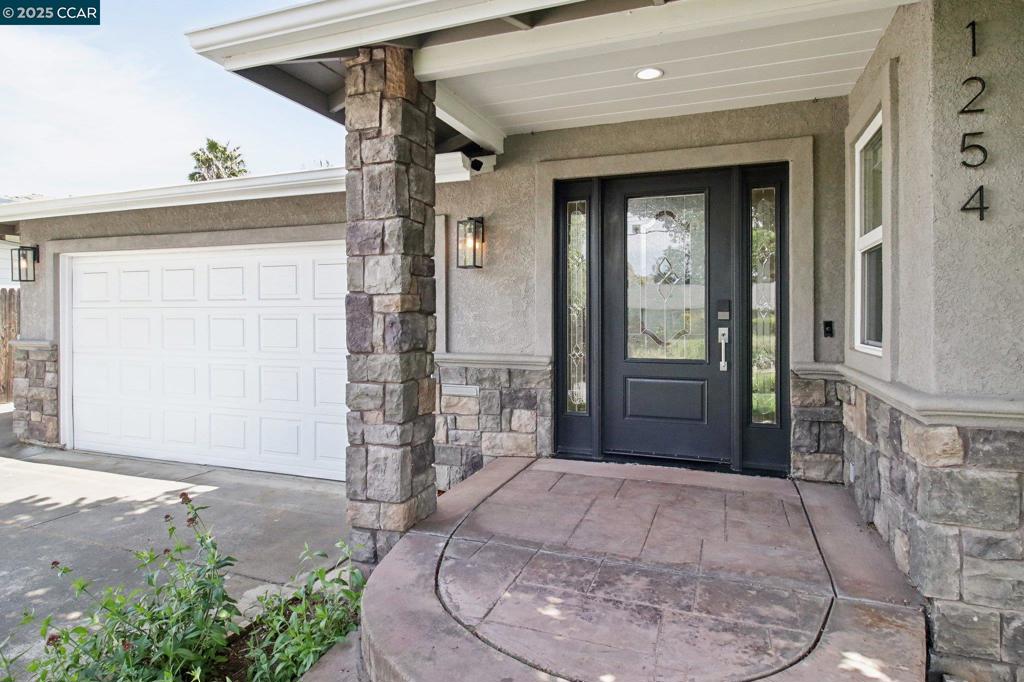 Welcome to your dream home—where style, comfort, and quality come together in perfect harmony. Nestled in a peaceful and well-kept neighborhood, this beautifully maintained 3bd/2.5bth property is the perfect blend of elegance and functionality. From the moment you arrive, you’ll be impressed by the appealing front exterior and lush, professionally landscaped yard—a true showstopper that invites you in. The heart of the home boasts a fully upgraded kitchen with a built-in refrigerator, featuring an expansive island, premium finishes, a new faucet and microwave, and an open layout that flows seamlessly into the living and dining areas—ideal for both entertaining and everyday living. Retreat to a serene primary suite, thoughtfully situated apart from the other bedrooms for added privacy. With direct access to the beautiful backyard, it’s your own peaceful escape. Enjoy new plush carpeting, tasteful design choices, and a shed that is a perfect space for a home office. Host dinner parties or enjoy quiet meals in the sophisticated formal dining room, complete with large scenic windows that frame the outdoors beautifully. Step outside into a vibrant garden oasis, perfect for relaxing or entertaining. Don’t miss out on this gem! Schedule your private showing today!