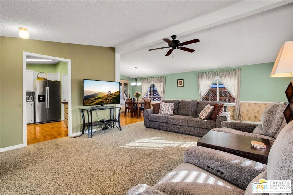 FEE LAND!! You own the land!! Don't miss the opportunity to own your own beautiful home in the resort style community of Vista Montana. This home offers 1272 square feet of living area with an open floor plan which offers many different possibilities to make this your own sanctuary. There are several outdoor areas which include a large front covered porch, several open deck areas, one of which has a fire pit. The rear yard is fenced with vinly fencing. There is a large storage shed, large two carport with gazebo lattice for privacy. The upgraded dual pane windows offer good energy efficiency. There is central air conditioning as well as evaporative cooler which has separate floor vents. Desert landsacping surrounds the exterior. The kitchen has stainless steel appliances and the property is being sold turnkey furnished. The primary bedroom has an ensuite bathroom and there are wood blinds throughout. The community offers good amenenties which include several pool and spa areas, recreation room, dog park, greenbelt walkway, exercise room, billiard room and much more. 433A Permanent foundation installed and recorded November 2024!