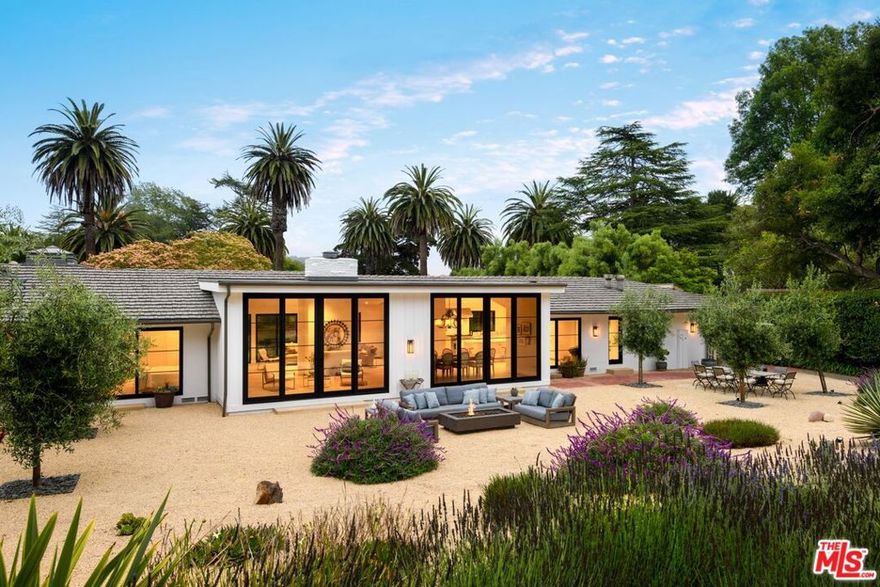In the coveted coastal enclave of Hope Ranch, lies a residence reborn. Privately set upon 1.023 acres of curated landscape, this 3-bedroom, 2.5-bath, single-level home spans 2,902 sq ft of living space, thoughtfully reimagined for both grace and longevity. Light-filled interiors flow effortlessly from generous living spaces to a timeless chef's kitchen and tranquil bedrooms, all reimagined with a balance of modern comfort and classic elegance. Outside, lush gardens, meandering stone pathways, and sun-drenched terraces create a setting for both quiet reflection and lively gatherings. Residents enjoy exclusive access to a private beach, miles of equestrian trails, and the rare privilege of a secluded estate just minutes from the vibrant heart of Santa Barbara. No detail was spared in the comprehensive renovation. A new roof, windows, HVAC system, wide plank hardwood floors, spray foam insulation, and 200A panel speak of quality. The designer kitchen showcases quartzite countertops, custom cabinetry, and top-tier appliances. Bathrooms are fully updated with timeless finishes.Beyond its walls, the property unfolds into lush, newly designed gardens laced with a fossil creek gravel walkway, a new septic system, and refined exterior upgrades, from siding to gutters to a newly finished garage.In this rarefied corner of Santa Barbara, life moves at the pace of the tides. Residents of Hope Ranch enjoy private beach access, meandering equestrian trails, and proximity to world-class schools and the vibrant heart of downtown.Let the beauty of Santa Barbara's most prestigious enclave welcome you home and book your personal viewing.