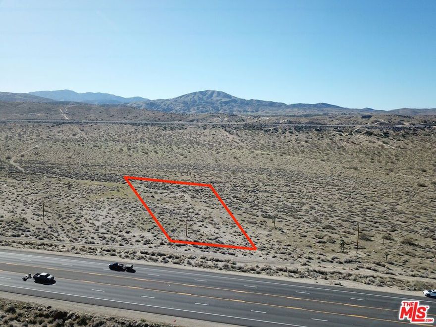 APN 3050-009-053. Lot Size Appx 66,854 sf, zoned LCA21. Great opportunity to build on a flat lot, over 1.5 acres, that fronts Pearblossom Hwy in the heart of Palmdale! Flat lot with desert & mountain views. Zoned heavy agricultural.  No reports or survey. Buyer to verify all information and rely on their own investigations. Drive by and MAKE OFFER.