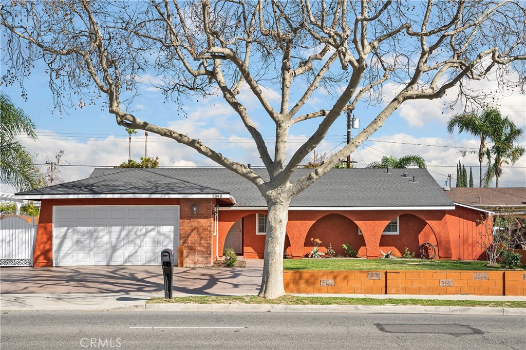 The nice curb appeal of this house will surely catch your attention. The light-filled open floor concept with kitchen, dining and living areas creates an inviting atmosphere from the moment you enter. The house boasts a master bedroom with ensuite bathroom, three good-sized bedrooms, another full bathroom and a bonus room in the back. The covered patio and a fenced private backyard will definitely enhance your outdoor living experience. The 2-car garage with direct access and a driveway provides ample parking. There are also laundry hookups and a new water heater in the garage. You will find a lot of storage space throughout. Located in a quiet neighborhood, it’s just minutes away from shopping, dining, good schools, parks and the 118 freeway. Do not miss your chance to call this lovely home yours!