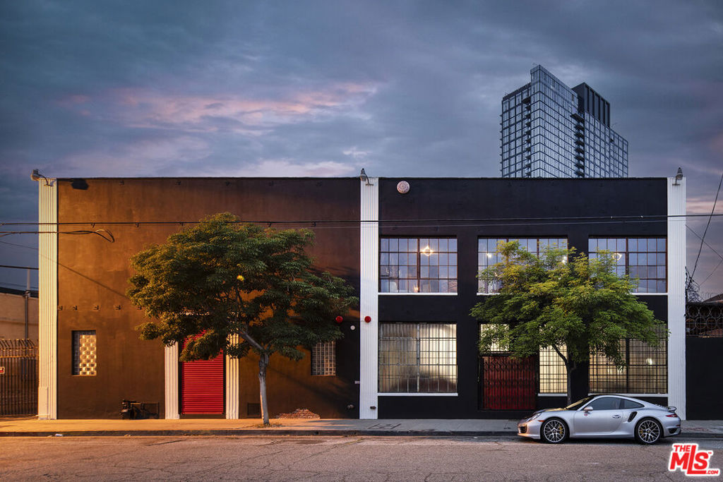 Introducing The Magnus Walker Warehouse. Situated in the heart of the Downtown Los Angeles Arts District, this magnificent and soulful two story brick loft building, circa 1902, is the ultimate inspiration ground for any creatively inclined owner/user or commercial business with an eye for a one of a kind trophy property in an A+ location.This captivating property has been inhabited and beloved by multi-hyphenate Magnus Walker since he purchased it in 2000. Since then, It has been in use as a live/work space, a lucrative film/television/commercial location, an art gallery, the flagship and workshop of his clothing company, Serious Clothing, and the home of his priceless car collection.The building itself, at over 25,000 square feet, features a private and secure gated entry in to a courtyard with parking for up to 12 cars on the exterior and significantly more inside if needed. Exposed brick walls, vintage patinated wood floors, soaring ceiling heights, skylights, casement windows, an operating freight elevator, two kitchens, garden and 360 degree downtown views from the rooftop. Occupying 3 lots on two parcels, there are multiple street frontage opportunities for commercial use. Perfect for a buyer looking for a recording studio or production complex/clubhouse. A very rare offering - a legitimate gem and a once in a lifetime opportunity - it is ready for its next stewards' imagination and vision. Shown by appointment to pre qualified buyers only.