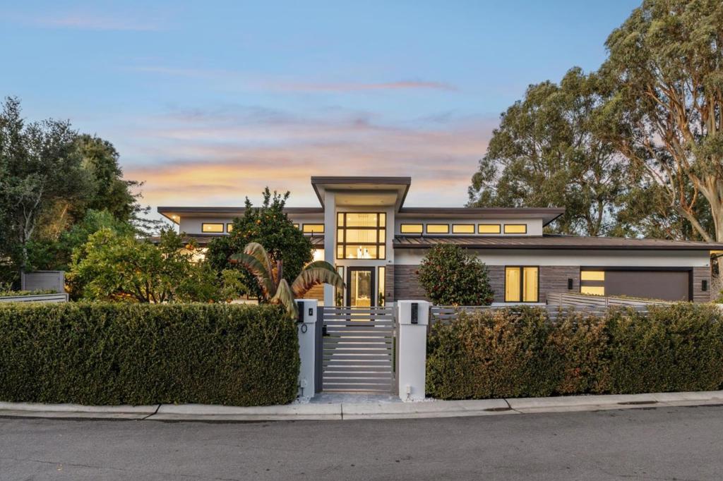 Perched atop a serene cul-de-sac in Hillsborough, this architecturally striking modern estate offers breathtaking, unobstructed views of the SF Bay. Built in 2020, this 7 bedroom and 9 baths home blends cutting-edge parametric design with luxurious functionality, creating a seamless flow between indoor and outdoor living. The main residence features 5 beds, 4 full baths, and 2 half baths, thoughtfully designed with high-end finishes and an open-concept layout that maximizes natural light and panoramic vistas. Floor-to-ceiling windows, sleek contemporary lines, and premium materials define the sophisticated ambiance. A separate ADU with its own private entrance adds versatility, offering 2 bedrooms, 2.5 baths, and a stylish, self-contained living space ideal for guests, extended family, or rental income. Nestled in a private and tranquil court, yet just minutes from downtown San Mateo and Burlingame, this home offers the perfect balance of seclusion and convenience. Enjoy an easy commute to major highways, and access to top-rated Hillsborough schools, making this an exceptional opportunity for those seeking both luxury and lifestyle. Approved plans available for a raised infinity edge pool and 500sqft gym. A rare find in one of the Bay Areas most prestigious communities.