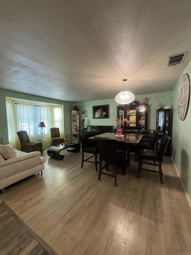 Welcome to 2219 El Toro Circle, located in the desirable 55+ community of El Grande Estates in Hemet. This well-maintained home features a bright and open floor plan with spacious living and dining areas, a functional kitchen, and a comfortable primary suite. Enjoy energy savings with a solar lease at just $114/month and the added convenience of a water softener. Residents of El Grande Estates benefit from a community clubhouse, pool, spa, and regular social activities that make it easy to stay active and connected. The neighborhood is close to shopping, dining, healthcare, and recreational opportunities, including golf, parks, and Diamond Valley Lake. Affordable, low-maintenance, and move-in ready, this home offers the perfect blend of comfort and convenience in a welcoming senior community.