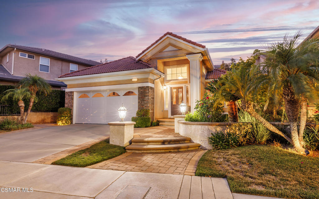 Welcome to the highly sought-after Sorrento Community in Porter Ranch, a 24-hour guard-gated neighborhood offering security, charm, and convenience. This rare single-story residence spans over 2,000 sq. ft. of thoughtfully designed living space, combining comfort with elegance. Step inside to find an inviting spacious living room, a formal dining area, and a separate family room with a cozy fireplace, perfect for gatherings. The open-concept chef's kitchen is a true centerpiece, featuring granite countertops, a large island, stainless steel appliances, custom cabinets, and window shutters throughout. The primary suite is a retreat of its own, complete with a soaking tub, separate shower, and abundant closet space. Additional highlights include custom marble flooring throughout, newer carpet in the bedrooms, recessed lighting, and original ownership showcasing pride of care and immaculate maintenance. A new air conditioning system and new stainless-steel appliances add to the move-in readiness. Outdoors, the custom-designed backyard is built for entertaining and relaxation, offering privacy with no homes directly behind and professional hardscape and landscaping. The Sorrento Community include two pools, spa, and play areas, along with being zoned for the award-winning Porter Ranch schools. You'll also be just minutes from The Vineyards shopping center, dining, and entertainment. This immaculate home truly has it all; location, upgrades, and lifestyle. Don't miss the opportunity to own one of the most desirable models in Sorrento!