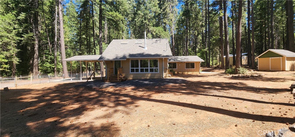 Two Parcels – Equestrian Ready – Magalia!
Rare chance to own two parcels in peaceful Magalia—untouched by fire and surrounded by Paradise Lake & forest. Main home is beautifully updated: new 25-year roof (˜2 yrs old), granite kitchen, stainless appliances, washer/dryer, newly painted, laminate floors, new carpet & Velux skylights. Garage with upgraded electrical & premium door—ready for a workshop or bonus room. New main & sub-panels with generator hookup.
Horse lovers will appreciate the no-climb fencing, self-latching gates & 900 sq. ft. barn. Landscaped, cleared, and flat yard with fenced garden. Gravel pull-through driveway offers RV parking with two 50-amp hookups (one under carport/patio) plus a 2,500-gal water tank.
Bonus 1.46-acre parcel with its own well—ideal for horses or future build. This versatile, well-maintained estate in the tranquil area of Magalia is a perfect blend of privacy, modern upgrades & rural living!