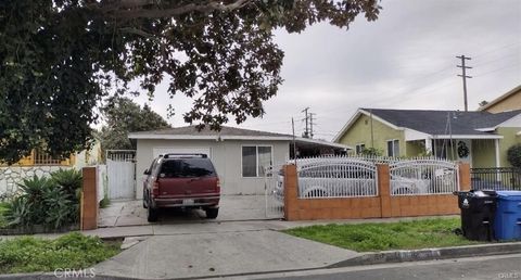 Photo of 910 E 76th Pl, Los Angeles, CA 90001 (MLS # DW26004832)