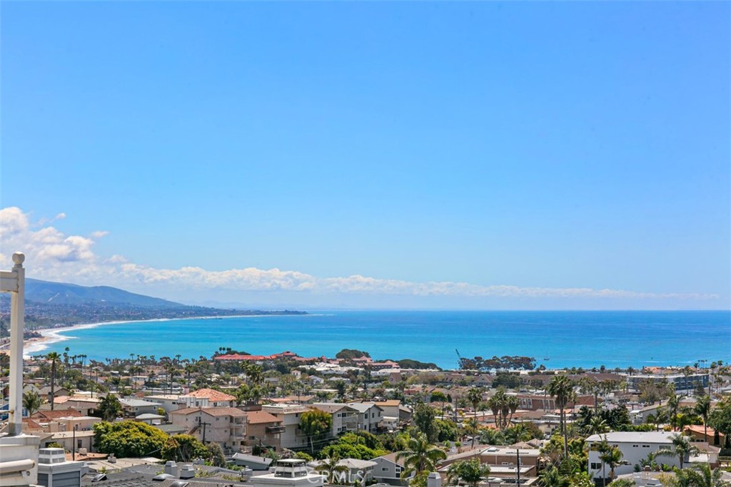 Available starting October 15, 2025, this absolutely beautiful furnished Dana Point home is offered for flexible stays from 1 to 6 months (minimum 30 days). With 3 bedrooms, 3 full bathrooms, and over 1,800 square feet of thoughtfully designed space, this multi-level retreat offers incredible panoramic coastline and city views.
Step inside to soaring vaulted ceilings and an open floor plan that flows seamlessly into the expansive living area. Dual sets of La Cantina doors open onto one of four spacious decks, setting the stage for breathtaking sunrises. The gourmet kitchen features marble countertops, a stylish backsplash, and a center island with extra storage, perfect for cooking and entertaining.
The home’s multi-level layout naturally separates the bedrooms, providing privacy and flexibility for guests. The primary suite offers high ceilings, a walk-in closet, walk-in shower, and a private deck, while the lower level includes two additional bedrooms, a full bathroom, and another spacious deck.
With four decks to choose from, you’ll have ample outdoor space to relax or entertain. Fully furnished and equipped for comfort, this home is ready for a short-term stay that feels like a true escape.
Located just minutes from Strands Beach, Dana Point Harbor, downtown shops, and local dining, this property is the perfect blend of convenience, luxury, and coastal charm.