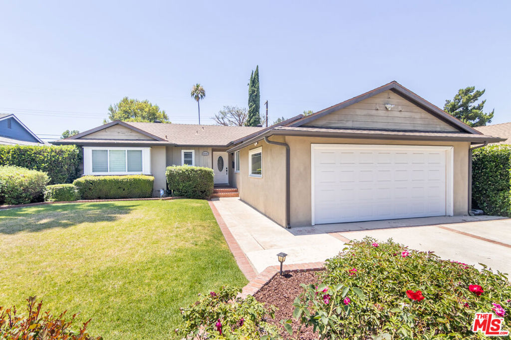 Welcome to this inviting 4 bedroom, 2 bath home in desirable West Hills. The open floorplan is perfect for both relaxing and entertaining, featuring lovely, engineered wood flooring in the main living areas, tile in the kitchen and baths, and carpet in the bedrooms. The kitchen comes equipped with refrigerator, oven, stove, microwave, dishwasher, touch-kitchen faucet, and laundry room with washer and dryer. Both bathrooms have vanities, tile, and stylish rubbed bronze fixtures. Enjoy outdoor living with a grassy front and back yard, and a covered patio, ideal for gatherings or quiet evenings. The primary bedroom offers its own private deck enhanced by a unique sliding barn door, providing a peaceful retreat. The home features a two-car garage with LED lighting, 220-volt electric car charging outlet, newer water heater, and whole-house Halo water filtration system. Additional highlights include dog run, central heat and A/C, interior wood shutters, fresh indoor paint, double-pane windows, and decorative fireplace. This amazing home is close to highly rated schools many shops and restaurants including Sprouts and Trader Joes.
