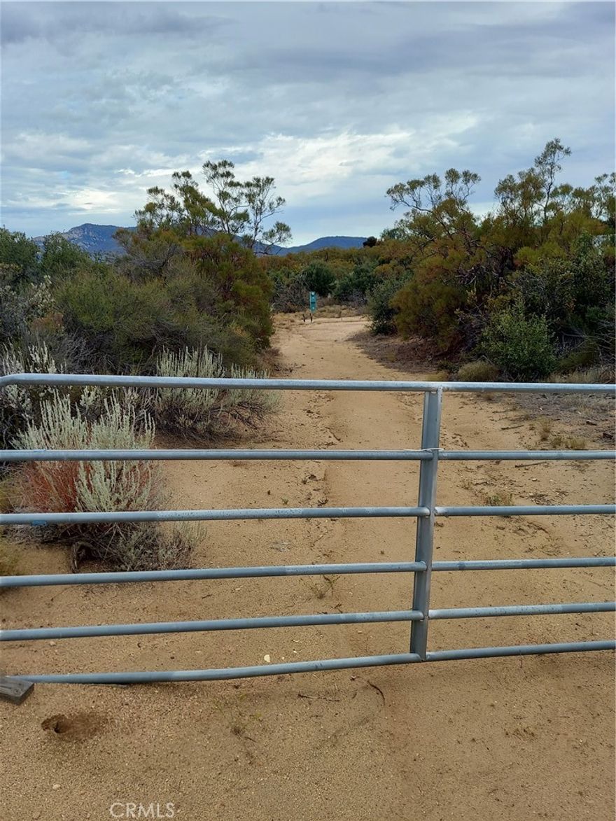 PRICED TO SELL. NICE 4.73 ACRE PARCEL WITH POWER AND A GOOD PRODUCING WELL. BEAUTIFUL VIEWS OF THE MOUNTAINS AND NOT FAR OFF PAVED BAUTISTA
