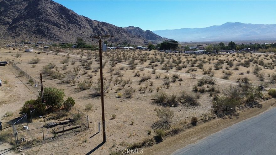 Discover a rare chance to secure a sizable 1.25-acre parcel in a peaceful, rural setting in Apple Valley. Nestled along Milpas Rd, this property offers broad possibilities from a custom site-built home to a manufactured residence, or a land banking hold for the future. With power lines visible nearby and plenty of room for parking toys, an outbuilding, or even small-scale hobby animals (buyer to verify), you’ll enjoy the tranquility of country living while remaining within reach of town conveniences.