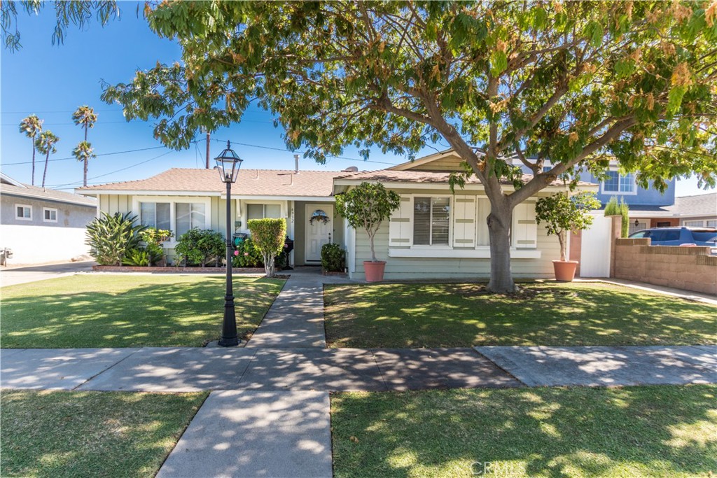 Situated in the highly sought-after San Tract of Buena Park, this Expanded home offers 4 bedrooms and 2 bathrooms with 1,949 sq ft of inviting living space on a 6,000 sq ft lot.
A beautifully maintained front lawn with a mature tree and attractive landscaping creates a welcoming first impression. Inside, the open layout features a spacious living room that flows effortlessly into the kitchen. The kitchen features granite countertops, a New dishwasher, and a built-in cooktop, combining both style and functionality. The adjacent dining area flows into an expansive family room, creating a versatile space for both entertaining and everyday comfort.
One of the 4 bedrooms has been opened up and used as an office. Another large room next to the family room could serve as a fifth bedroom or Bonus room.
Other features include, a Remodeled bathroom, central A/C, Recessed lighting, copper plumbing. Long driveway leads to detached garage, ideal for possible RV parking. TOP RATED SCHOOLS include Buena Terra Elementary, Kennedy High School and prestigious Oxford Academy.