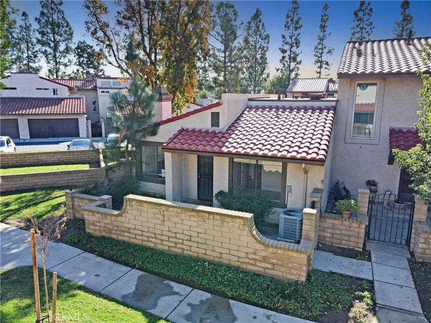 Outstanding single story condo in the great Marlborough Villa community.  This Rancho Cucamonga home is a corner unit with plenty of ambient light.  It provides 2 bedroom and 1-1/4 bath. This is perfect for small families or retirees.  The home is freshly painted with new flooring and carpet.  This great complex offers pools, tennis courts, and many other great amenities.  This unit also offers additional close by parking for that third car, friends, or visiting family members.  Perfect location to nearby grocery stores and restaurants.  This Single story home is very desirable and will not last.  Don't miss out!