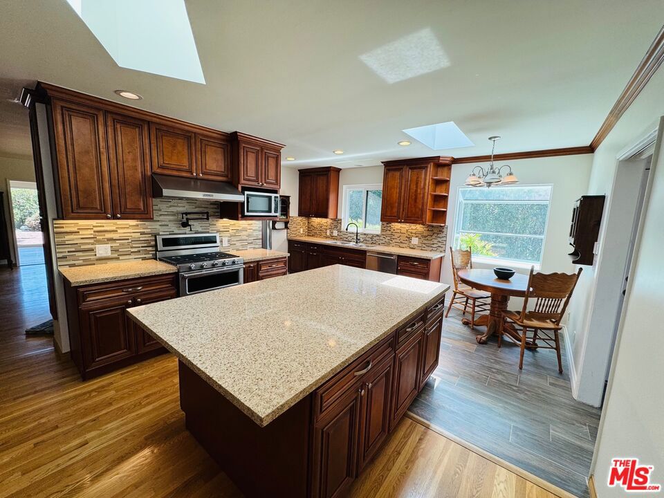Prime Point Dume location just moments from the State Preserve and local beaches. This 4-bedroom, 3-bathroom ranch-style home offers a coastal lifestyle featuring an updated interior with hardwood floors, stainless steel kitchen appliances, and a dedicated home office. Offered partially furnished or unfurnished Initially for a 6-month lease term, then month-to-month after that. Property is in final permitting stages for pool and hardscape construction; tenant may choose to remain during construction or vacate. Detached Guest house not included. Contact listing agent for details.