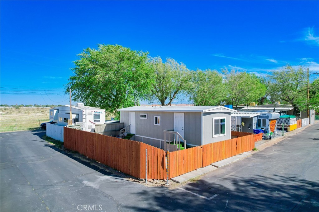 Affordable & Fully Renovated 1-Bedroom Mobile Home! Looking for your first property? This fully renovated 1 bed, 1 bath mobile home is a perfect starter! With approximately 280 sq ft of smart, modern living space, it's move-in ready and packed with updates—including a brand-new roof for peace of mind. A washer and dryer will be installed for added convenience, and a new shed provides extra storage space. Located on leased land, this home offers an affordable way to own property without the hefty price tag. Whether you're starting out or looking to downsize, this charming home is a fantastic opportunity!
