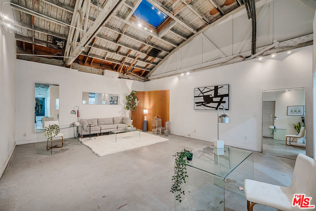 An enchanting 1,150 sqft workspace perfect for any small business! Ideal for a discrete barbershop or art studio. Smooth concrete floors and a vaulted ceiling provide for an inviting work area. Private office space carved out of large main work area. Includes a half bathroom and additional sink. Bathroom currently being remodeled. Two skylights provide plenty of natural lighting. Secured glass door entrance and plenty of parking. Signage permitted. Located on S Broadway between 23rd and 24th Streets. Available for immediate occupancy at $2,500 per month.