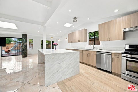 Photo of 6848 Sylvia Avenue, Los Angeles, CA 91335 (MLS # 26986001)