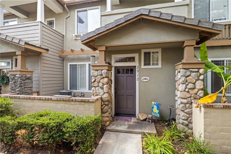 Located behind the beautiful rod iron gates to the "THE BUNGALOWS" and highly desirable Los Alamitos School District is this thoughtfully well-maintained turn key home! Upon entry of this beautiful residence, you will instantly notice the seamless flow of the beautiful hardwood floors leading you into the stunning kitchen and living room with high ceilings and an abundance of natural light. The open concept layout of the dining area and living room area meets the functionality with an attached 2 car garage, large laundry room and ample storage throughout. The inviting ambiance with a decorative fireplace. All bedrooms and full bathrooms are situated upstairs for ultimate peace and tranquility. The primary en-suite has a walk-in closet and bathroom. This gem of a home is conveniently located in walking steps to Los Alamitos High School, El Dorado Park Estates, El Dorado Nature Center, Shenandoah At the Arbor 405, 605, 91 and 22 freeways are just around the corner. What more could you ask for!!!