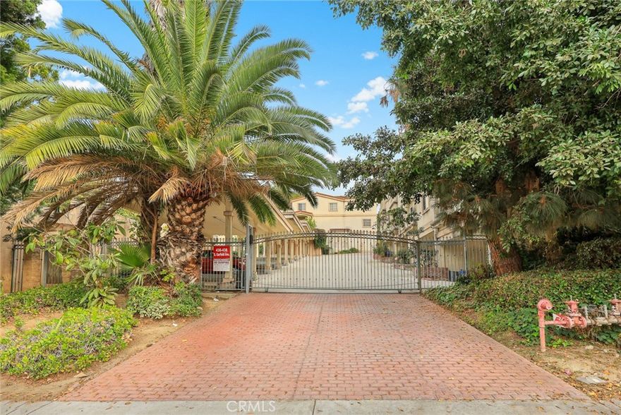 Welcome to this beautiful 1997-built townhouse in a gated community within the award-winning Mark Keppel School District. This home features 4 bedrooms and 3 bathrooms, including a convenient downstairs bedroom. The main floor offers a bright split open-concept layout with high ceilings, recessed lighting, and an elegant fireplace. Seprate dining room next to the kitchen. The spacious kitchen includes an oversized island, granite countertops, ample cabinetry, and stainless steel appliances. Upstairs are three generous bedrooms, all with walk-in closets, including a luxurious primary suite. Additional highlights include an upgraded glass staircase and a private front yard perfect for relaxing. The HOA covers insurance, trash, and common-area maintenance. Conveniently located close to restaurants, markets, and shopping. Move-in ready and a must-see!