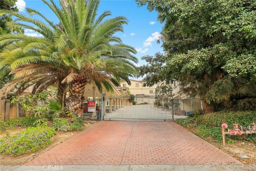 Welcome to this beautiful 1997-built townhouse in a gated community within the award-winning Mark Keppel School District. This home features 4 bedrooms and 3 bathrooms, including a convenient downstairs bedroom. The main floor offers a bright split open-concept layout with high ceilings, recessed lighting, and an elegant fireplace. Seprate dining room next to the kitchen. The spacious kitchen includes an oversized island, granite countertops, ample cabinetry, and stainless steel appliances. Upstairs are three generous bedrooms, all with walk-in closets, including a luxurious primary suite. Additional highlights include an upgraded glass staircase and a private front yard perfect for relaxing. The HOA covers insurance, trash, and common-area maintenance. Conveniently located close to restaurants, markets, and shopping. Move-in ready and a must-see!