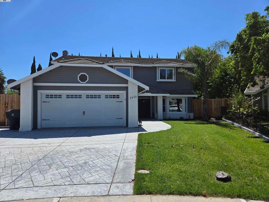 Sensational remodel in desirable Tracy location. The home boasts newly installed windows, flooring, recessing lighting, complete kitchen remodel, and fine craftsmanship throughout. The kitchen features new corian counter tops, farmhouse sink, recessed lighting, and stainless-steel appliances. The wood staircase leads you to the upper-level space with four spacious bedrooms, including a master retreat, walk in closet, and master bath. The hallway bathroom was completely remodeled featuring new shower doors, flooring, and pristine tile work. The spacious park-like size yard features side access, new perimeter fences, and a wooden pergola. Freshly painted interior and exterior. Newly poured concrete in the front and backyard. Convenient to schools, parks, shopping, with easy access to freeway.