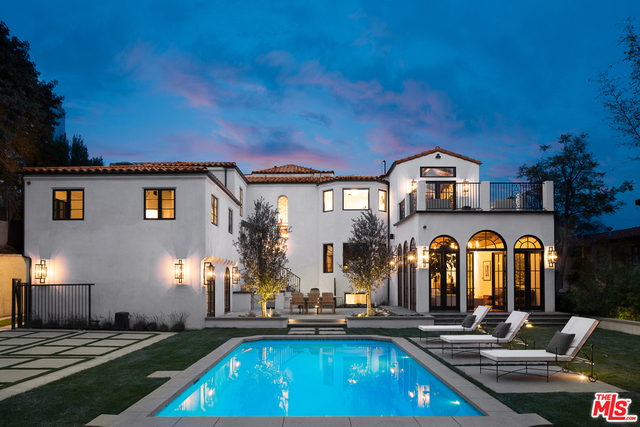 Situated on one of the most desirable streets in Los Feliz, this stunning 1930s Spanish has been masterfully restored. Once owned by the prominent family who founded the Ralphs Grocery Co., it was essential to retain the property's original integrity while imbuing it with every imaginable modern convenience. The property is comprised of three structures, main house, guest house and pool-side loggia, totaling 7,200 square feet, six bedrooms and nine bathrooms. On arrival, drive through a private gate into a sizable motor court and park in one of eight parking spaces, including a two-car garage. In the main house, one is greeted by a voluminous and gracious foyer, capturing the essence of the entire property, with period details such arched openings, clear-leaded glass windows, restored Mahogany woodwork and original Spanish tile flooring. The property exemplifies the most graceful union of timeless elegance and high-end technology. There are simply too many details to list.
